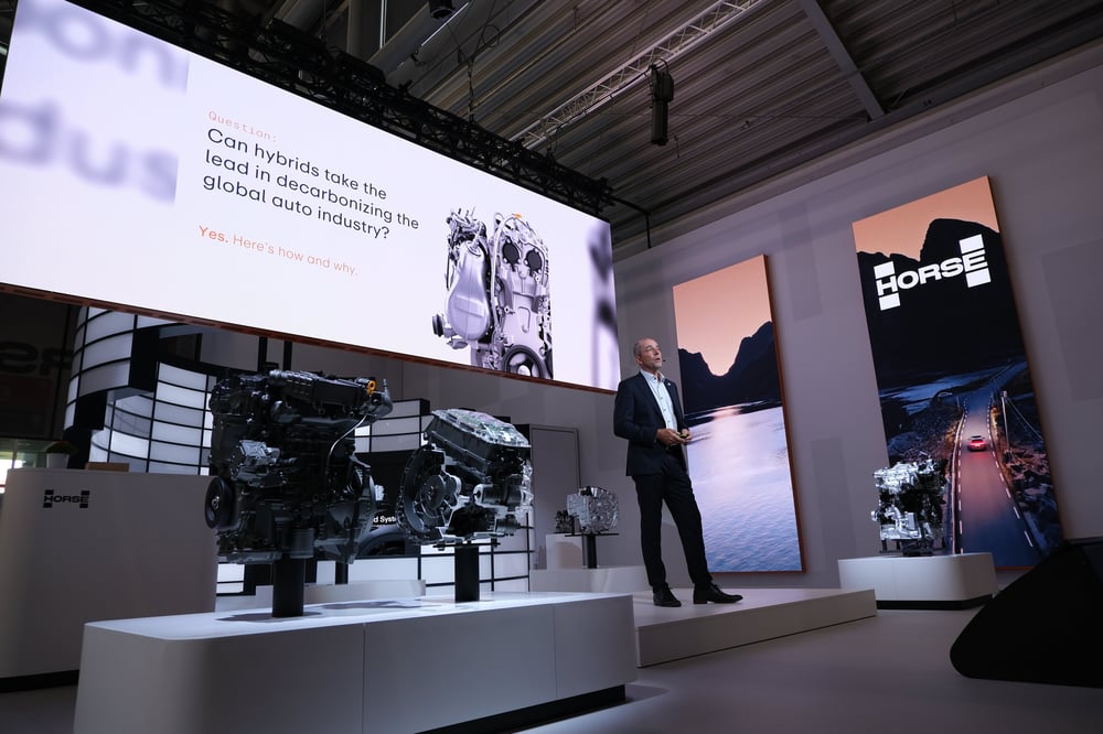 Horse Powertrain CEO Matias Giannini gives a speech at the Horse Powertrain booth