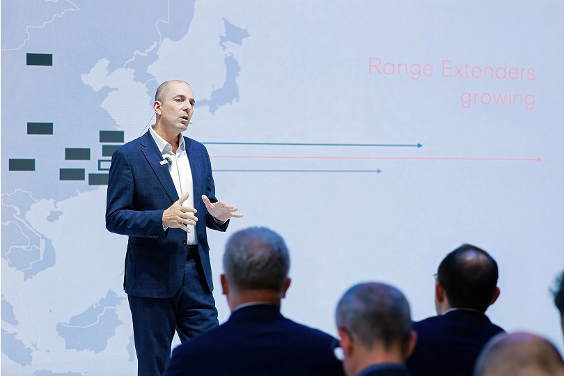 CEO Matias Giannini speaking to the audience on a fair